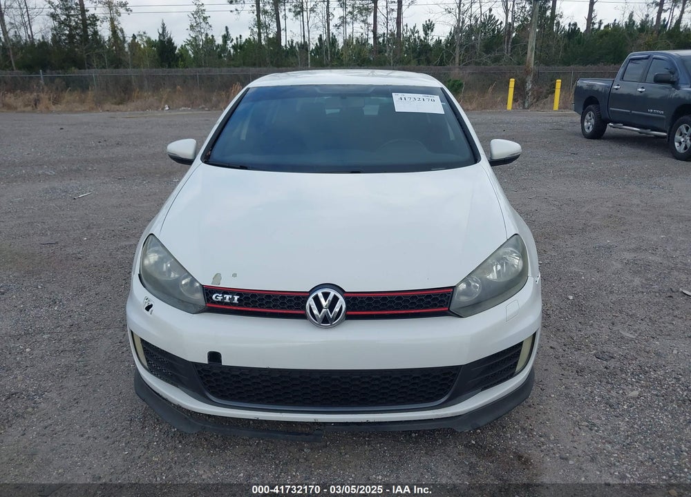 2013 VOLKSWAGEN GTI VIN: WVWHD7AJ1DW093931