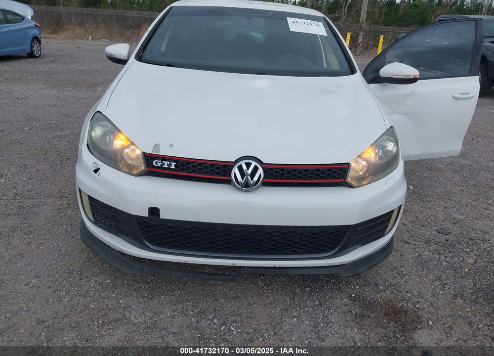 2013 VOLKSWAGEN GTI VIN: WVWHD7AJ1DW093931