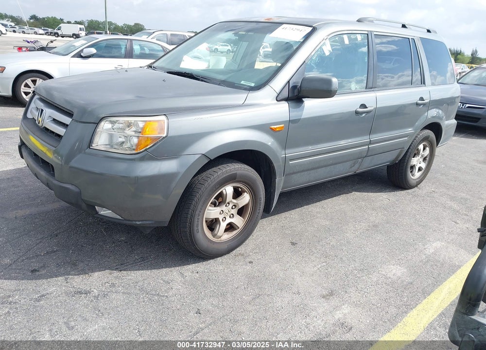 2007 HONDA PILOT EX-L VIN: 5FNYF285X7B045522