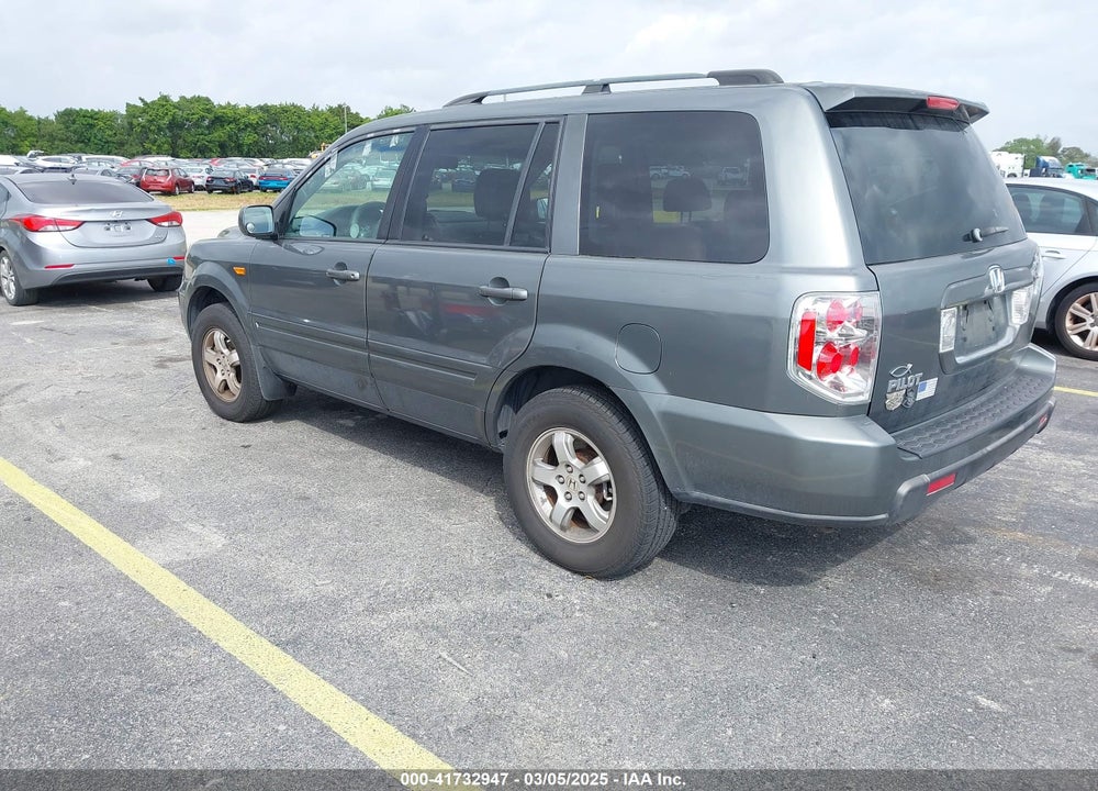 2007 HONDA PILOT EX-L VIN: 5FNYF285X7B045522