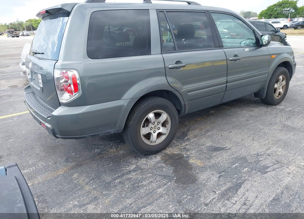 2007 HONDA PILOT EX-L VIN: 5FNYF285X7B045522