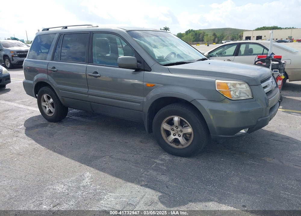 2007 HONDA PILOT EX-L VIN: 5FNYF285X7B045522