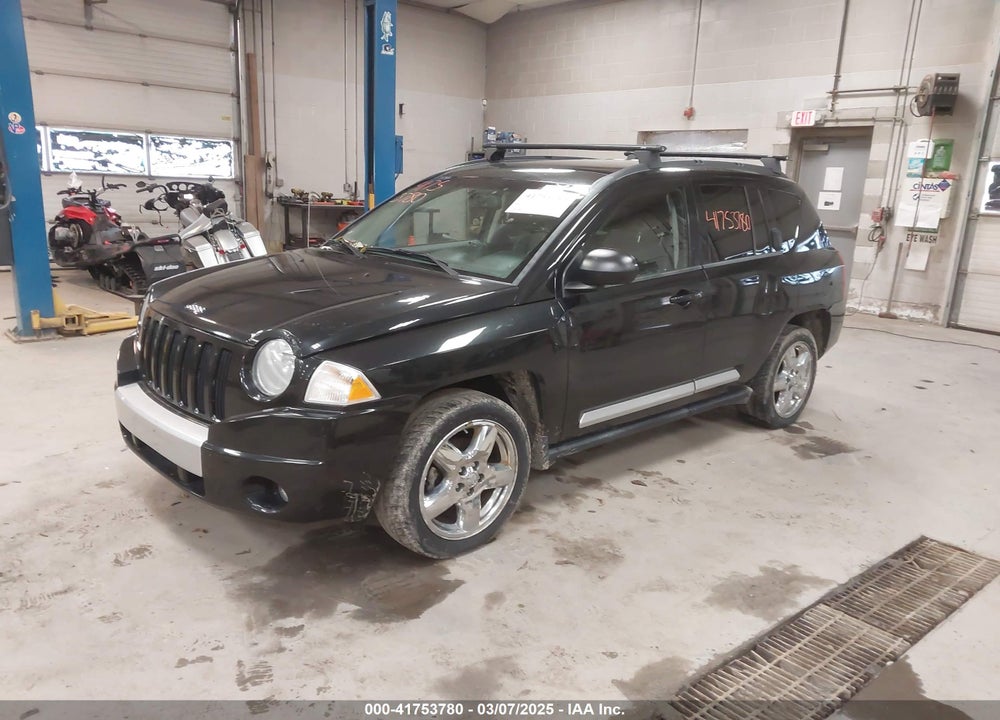 2010 JEEP COMPASS VIN: 1J4NF5FB7AD595430