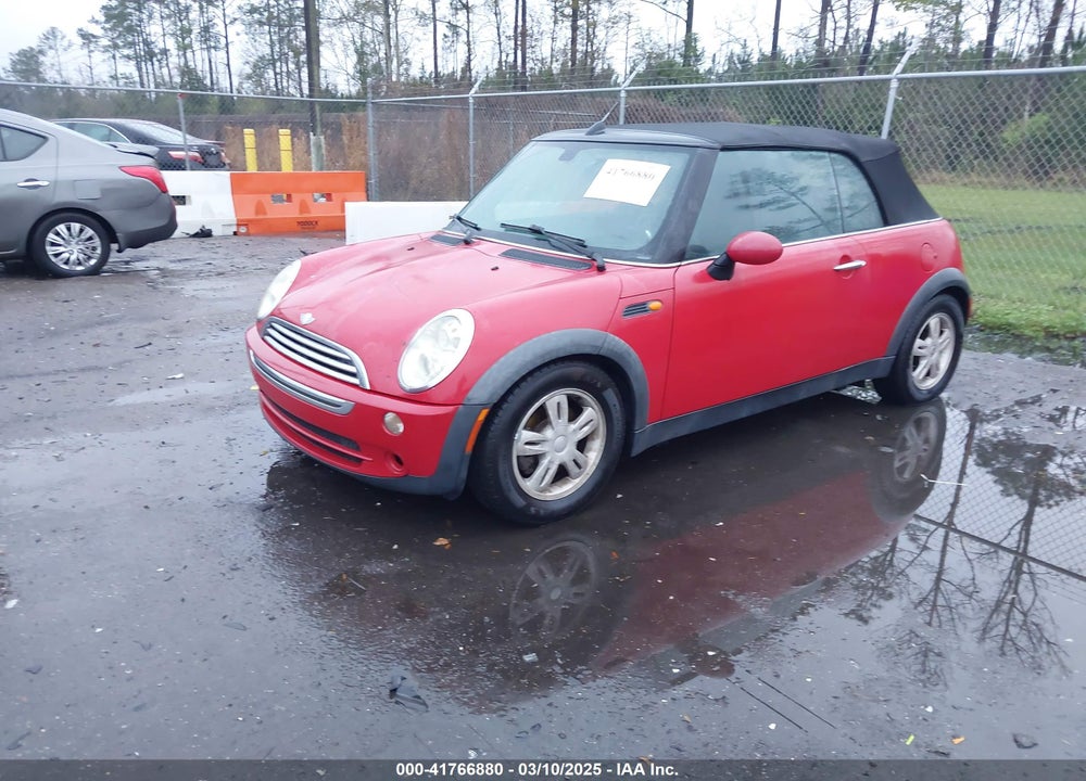 2006 MINI COOPER VIN: WMWRF33526TF64836