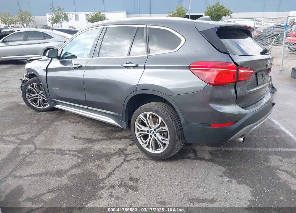 2017 BMW X1 VIN: WBXHT3Z32H4A57335