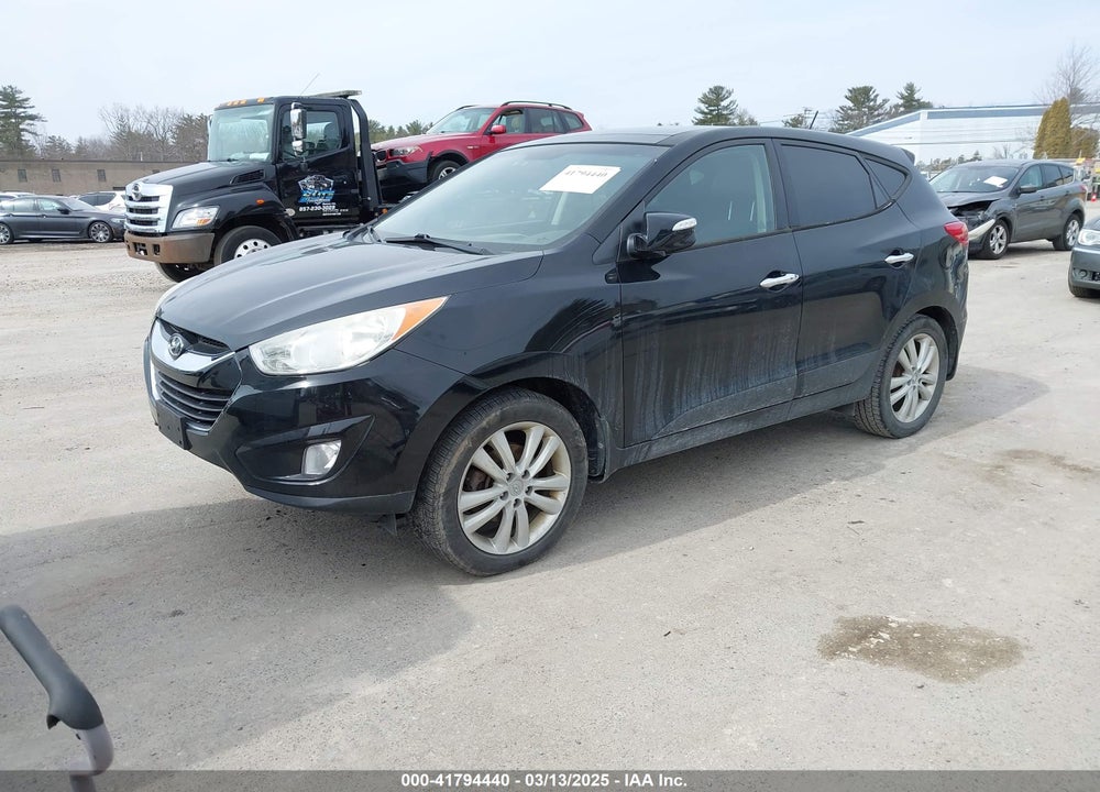 2013 HYUNDAI TUCSON VIN: KM8JUCAC4DU690168