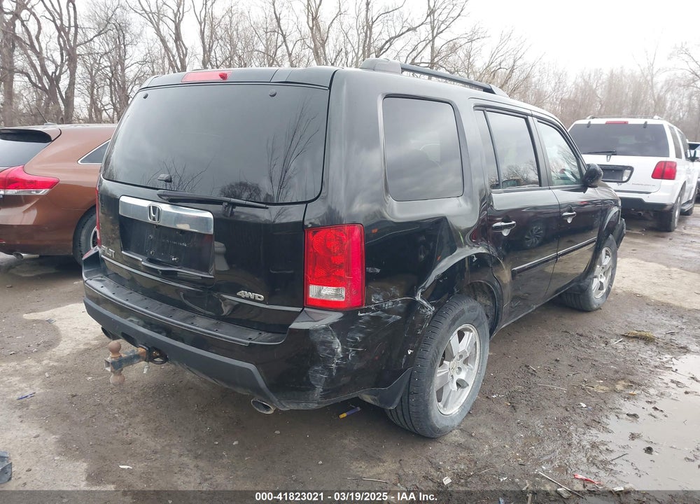 2011 HONDA PILOT EX-L VIN: 5FNYF4H61BB010963