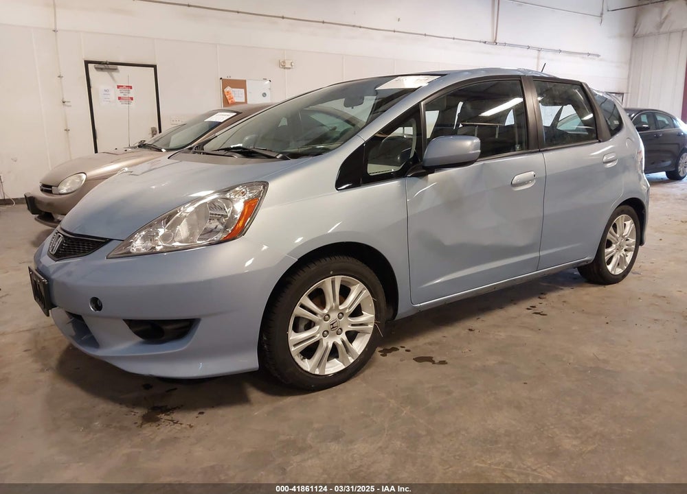 2009 HONDA FIT VIN: JHMGE88489S005033
