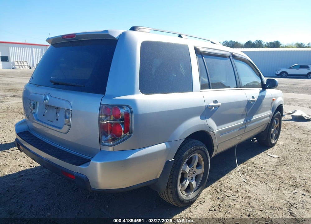 2006 HONDA PILOT EX-L VIN: 5FNYF28536B011100