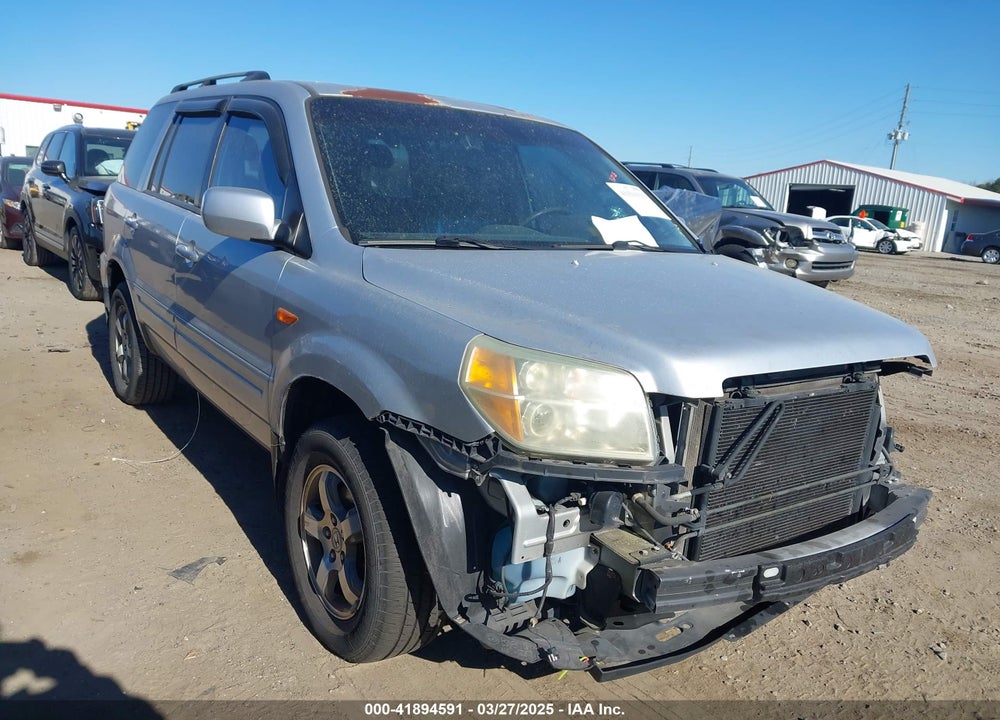 2006 HONDA PILOT EX-L VIN: 5FNYF28536B011100