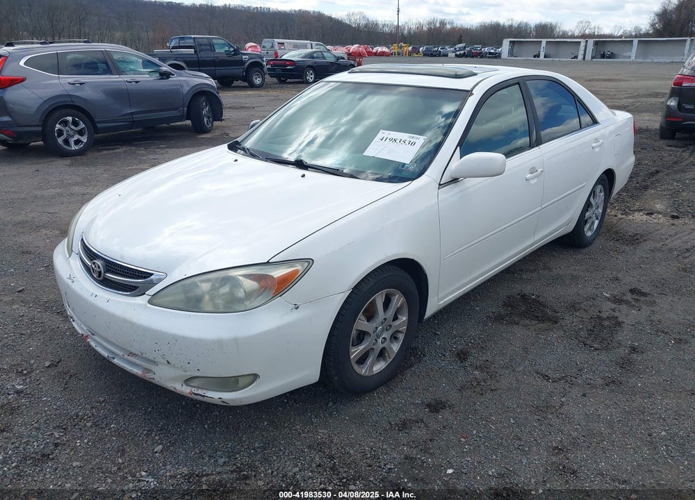 2004 TOYOTA CAMRY LE VIN: JTDBE32K140249889