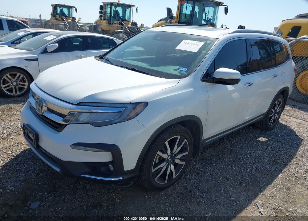 2021 HONDA PILOT 2WD TOURING 8 PASSENGER VIN: 5FNYF5H95MB001847
