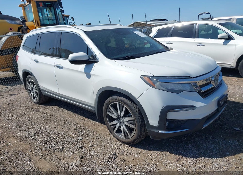 2021 HONDA PILOT 2WD TOURING 8 PASSENGER VIN: 5FNYF5H95MB001847