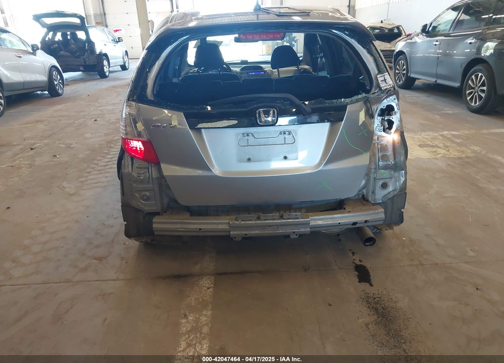 2009 HONDA FIT VIN: JHMGE87449S012630