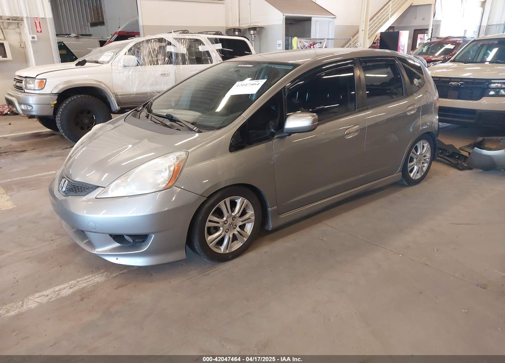 2009 HONDA FIT VIN: JHMGE87449S012630
