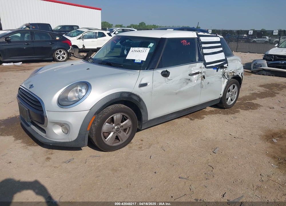 2016 MINI COOPER VIN: WMWXU1C52G2D10472