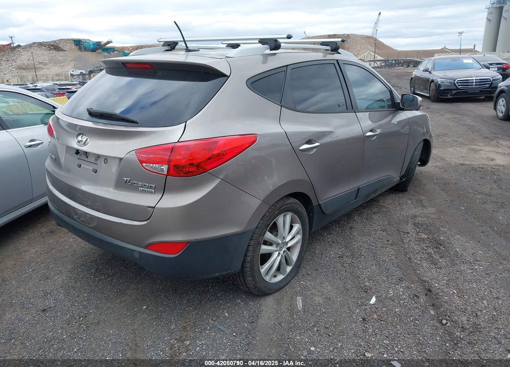 2012 HYUNDAI TUCSON LIMITED VIN: KM8JU3AC1CU499113