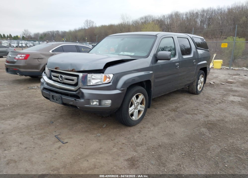 2011 HONDA RIDGELINE RTL VIN: 5FPYK1F54BB003338