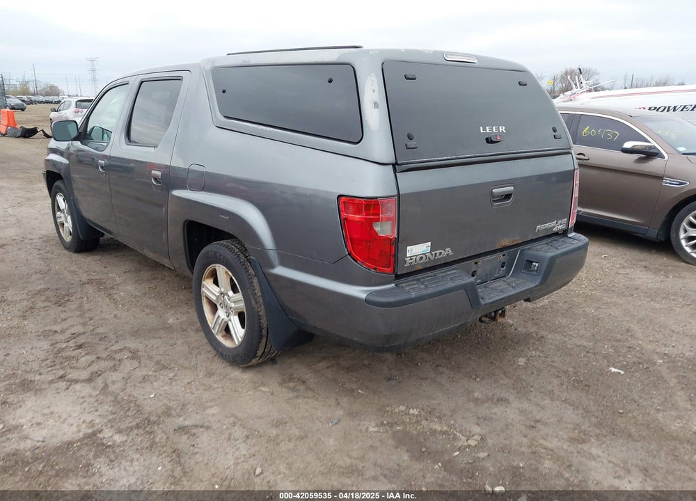 2011 HONDA RIDGELINE RTL VIN: 5FPYK1F54BB003338