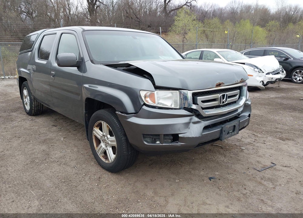 2011 HONDA RIDGELINE RTL VIN: 5FPYK1F54BB003338