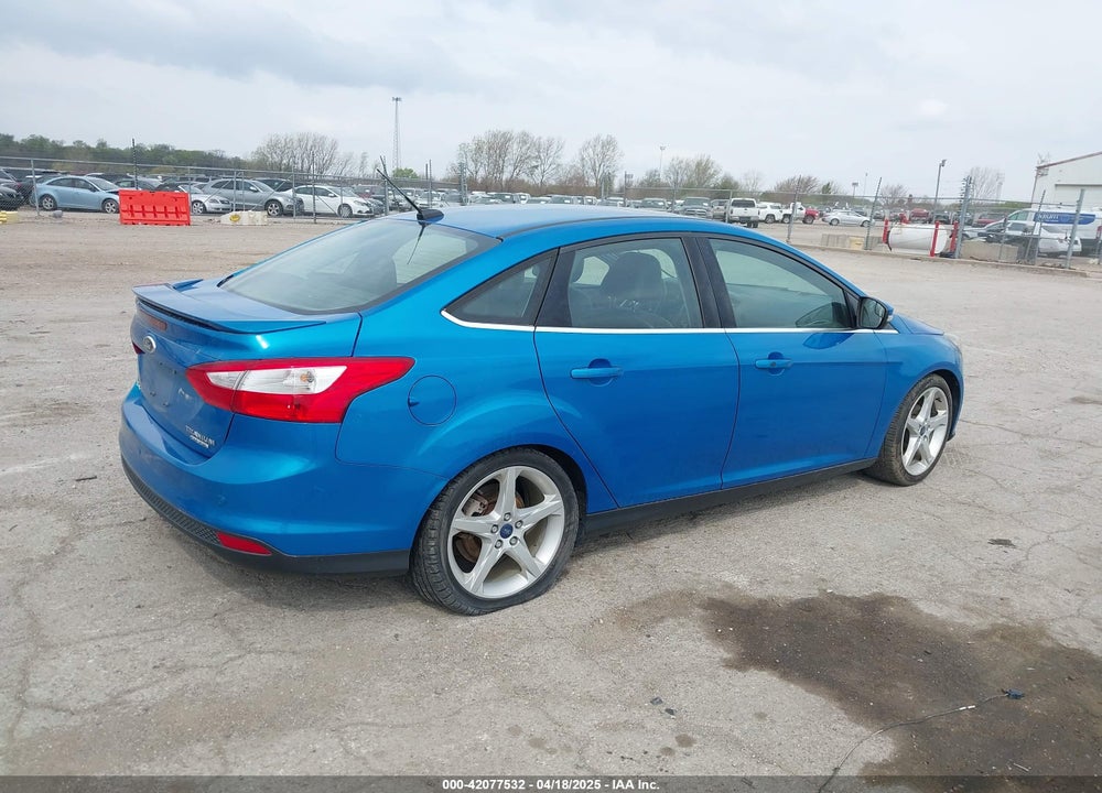 2014 FORD FOCUS TITANIUM VIN: 1FADP3J29EL253540