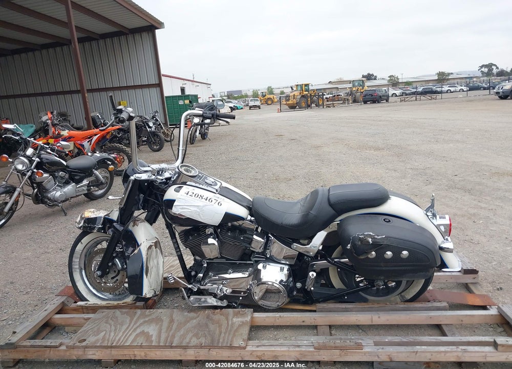 2012 HARLEY-DAVIDSON FLSTN SOFTAIL DELUXE VIN: 1HD1JDV18CB011457