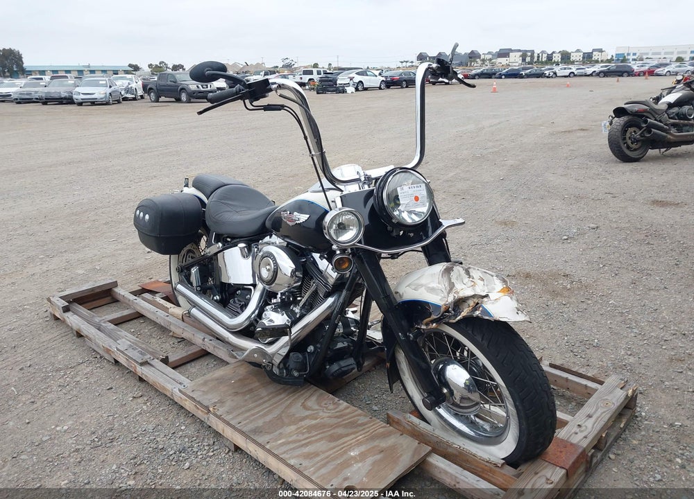 2012 HARLEY-DAVIDSON FLSTN SOFTAIL DELUXE VIN: 1HD1JDV18CB011457