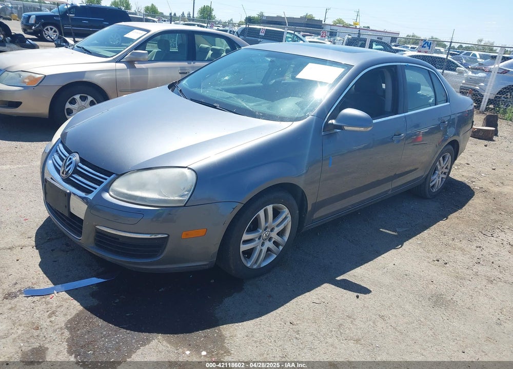 2009 VOLKSWAGEN JETTA VIN: 3VWRL71K89M135838