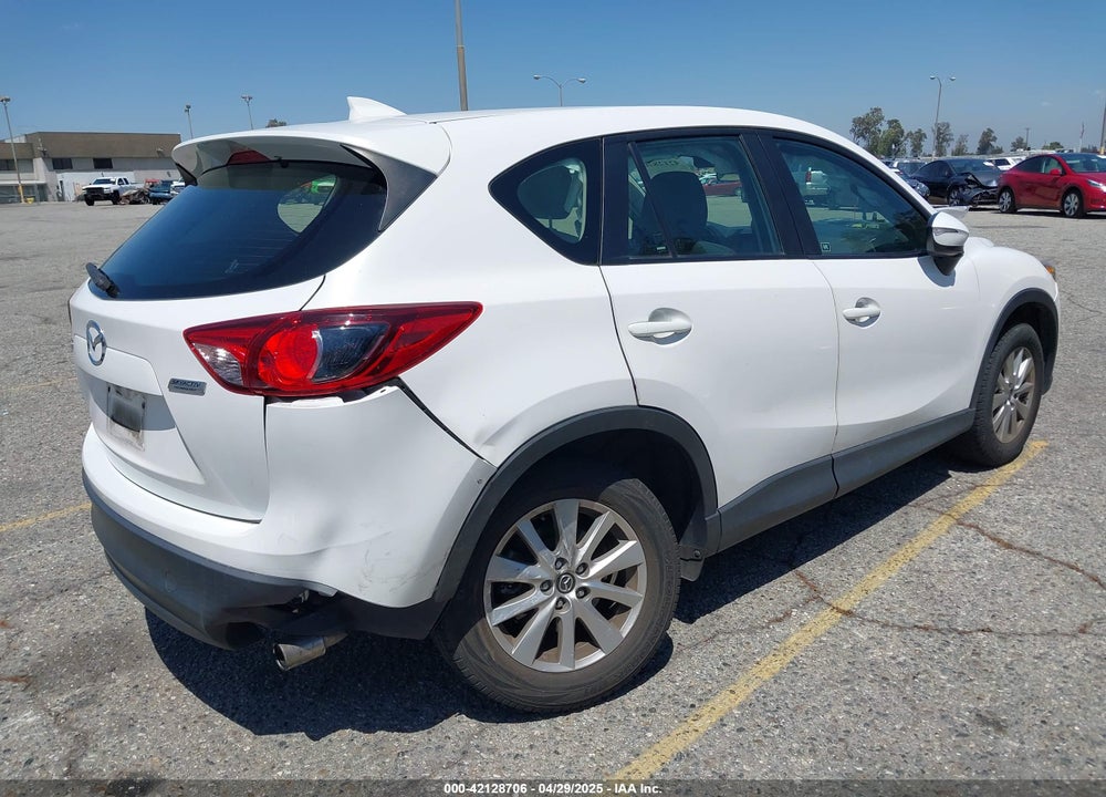 2016 MAZDA CX-5 SPORT VIN: JM3KE2BY5G0793032