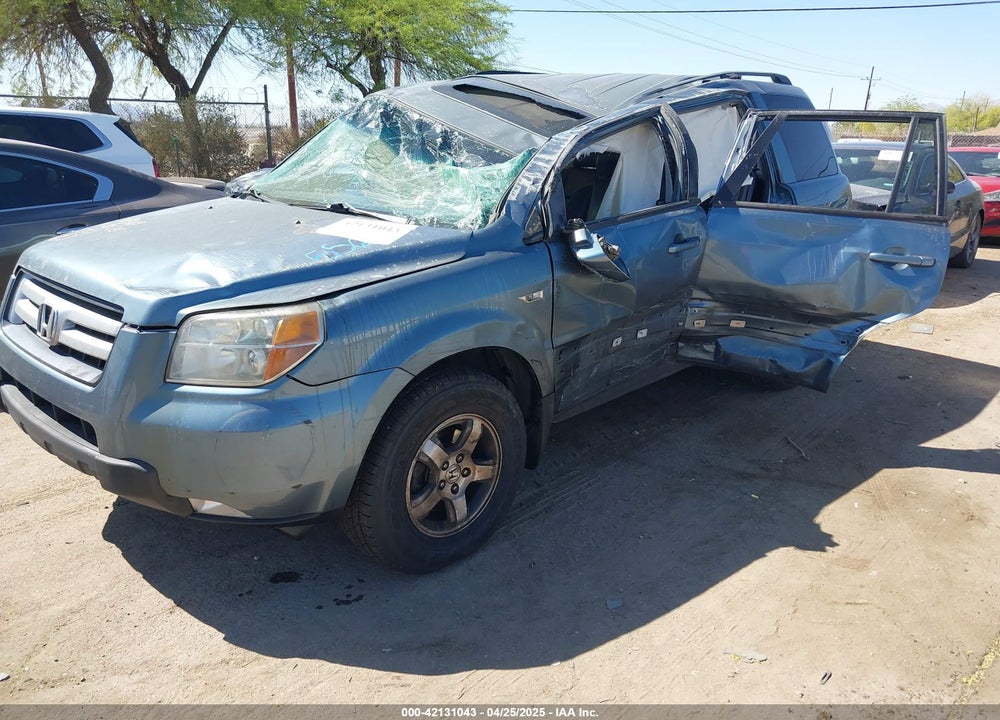2006 HONDA PILOT EX-L VIN: 2HKYF18626H556385