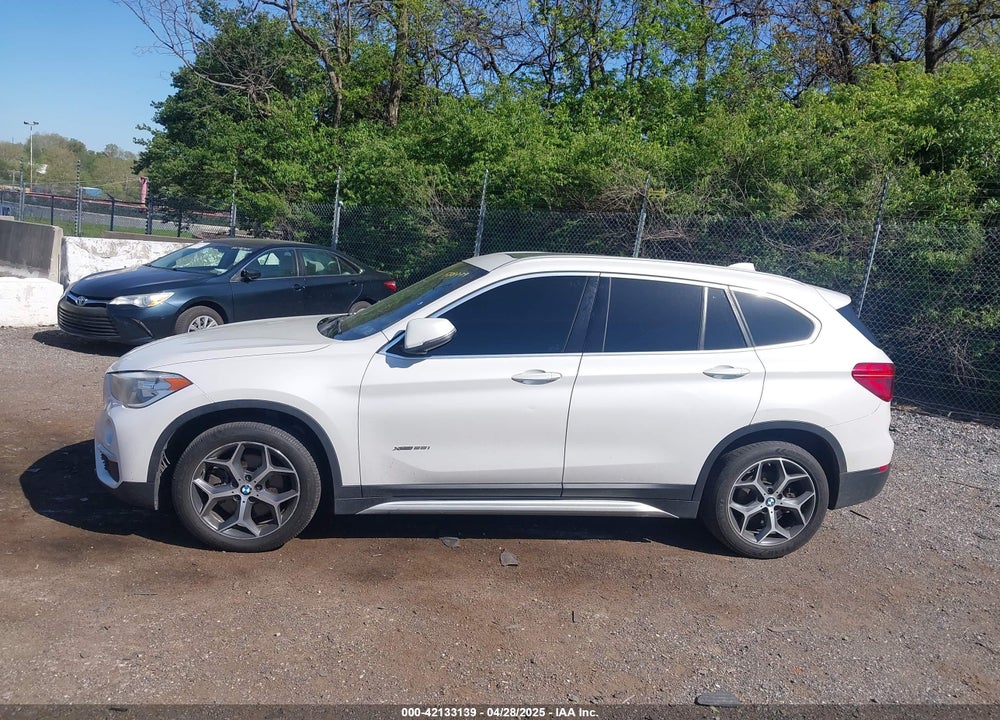 2018 BMW X1 VIN: WBXHT3C37J5F88779