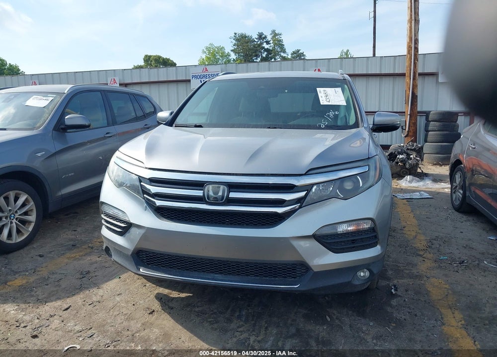 2018 HONDA PILOT VIN: 5FNYF5H99JB018095
