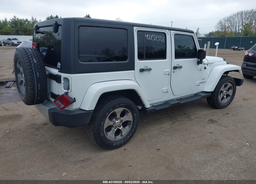 2016 JEEP WRANGLER UNLIMITED SAHARA VIN: 1C4HJWEG8GL345391