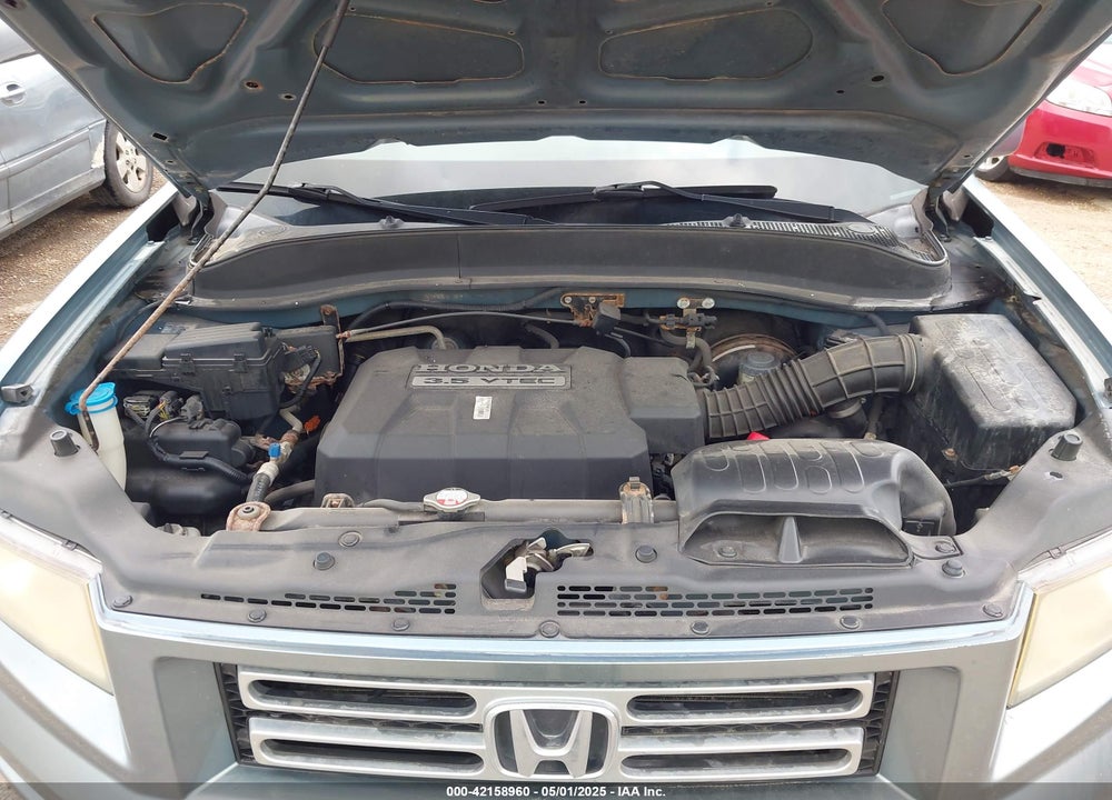 2006 HONDA RIDGELINE RTL VIN: 2HJYK16576H507354