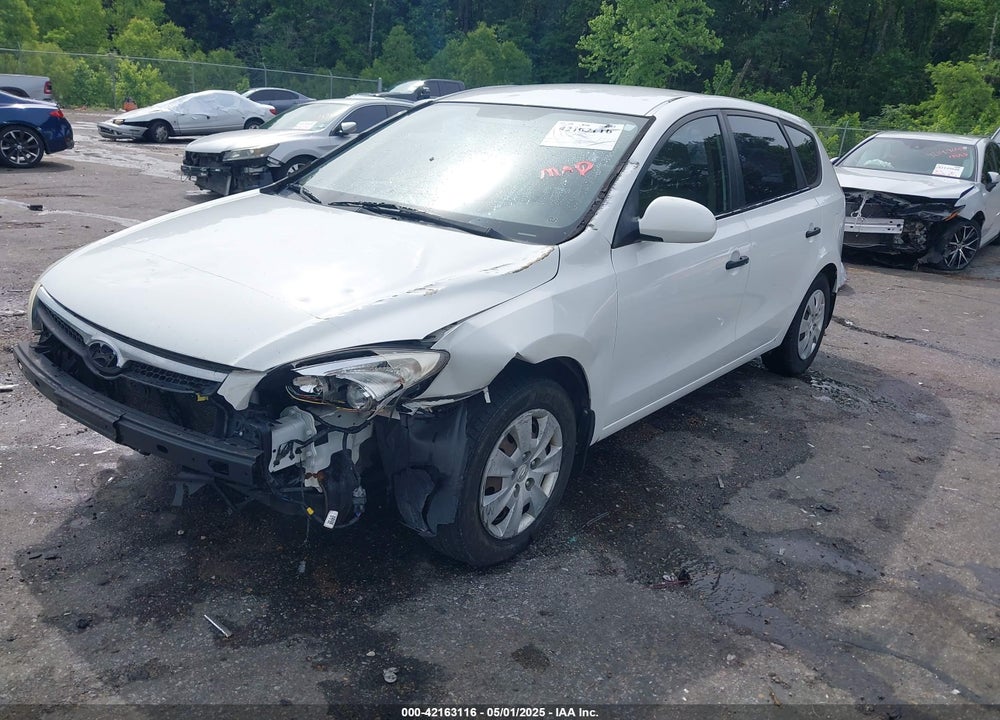2010 HYUNDAI ELANTRA TOURING GLS VIN: KMHDB8AE5AU052721