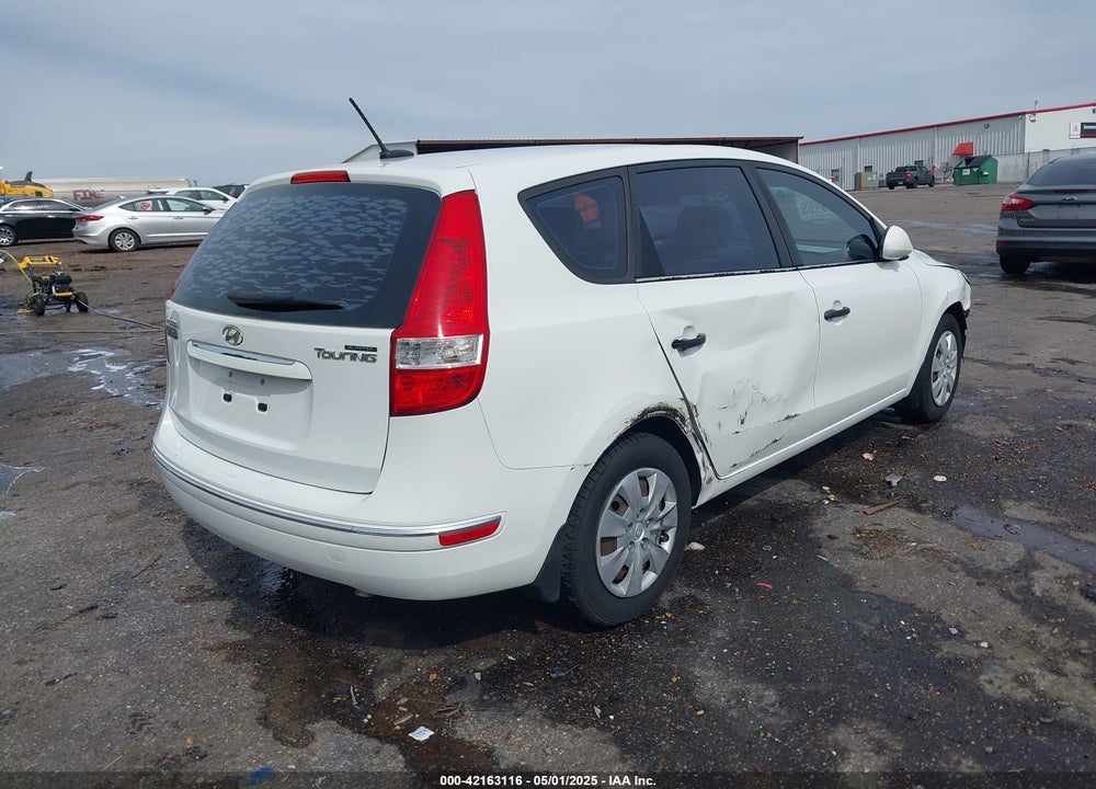 2010 HYUNDAI ELANTRA TOURING GLS VIN: KMHDB8AE5AU052721