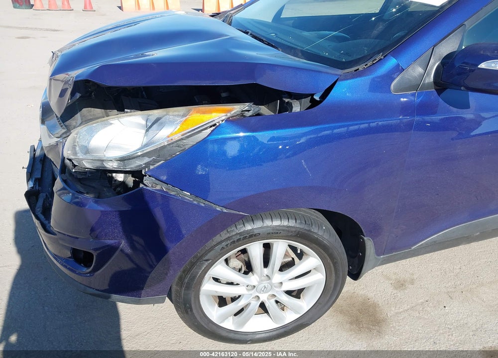 2012 HYUNDAI TUCSON LIMITED VIN: KM8JU3AC7CU530204