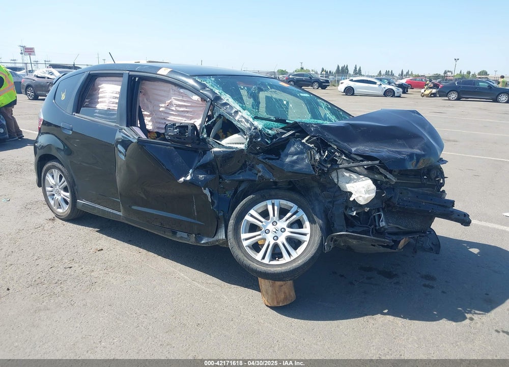 2009 HONDA FIT SPORT VIN: JHMGE88469S057339