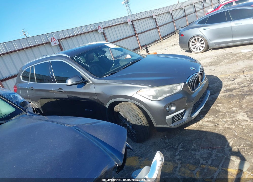 2017 BMW X1 VIN: WBXHU7C34HP925411