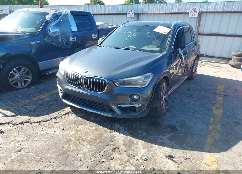 2017 BMW X1 VIN: WBXHU7C34HP925411