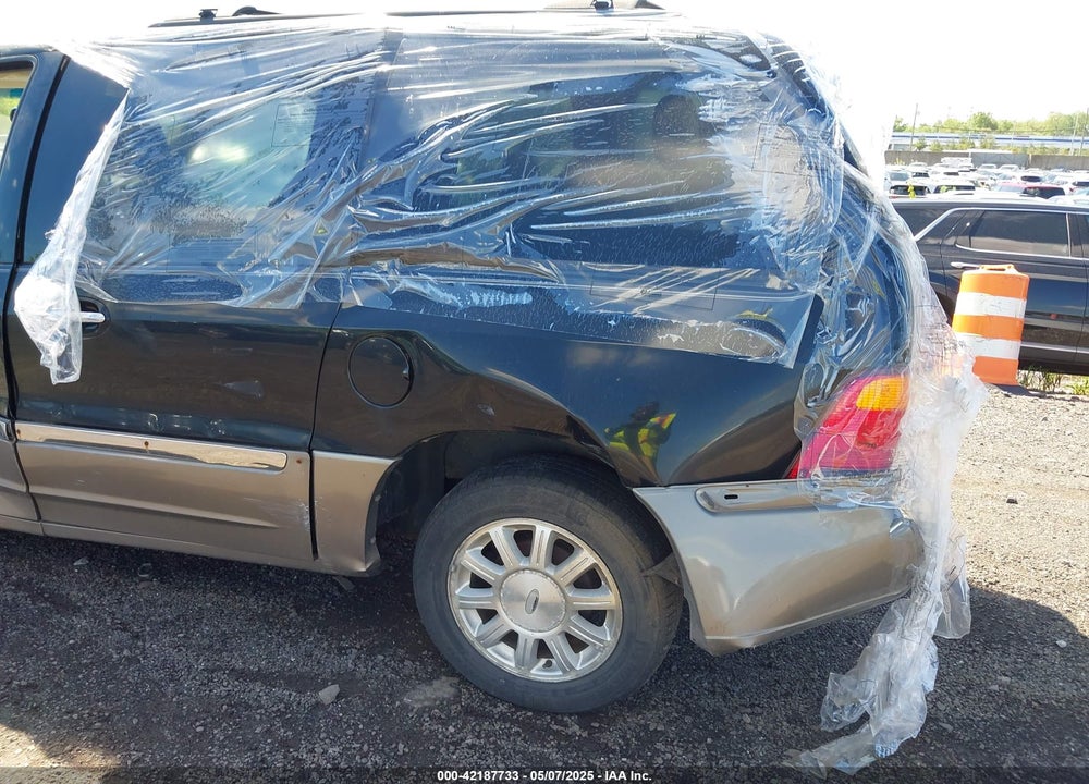 2003 FORD WINDSTAR VIN: 2FMDA58433BB76963