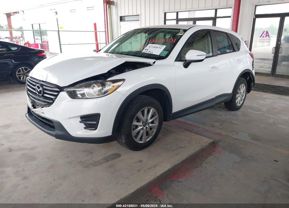 2016 MAZDA CX-5 SPORT VIN: JM3KE2BY5G0747183