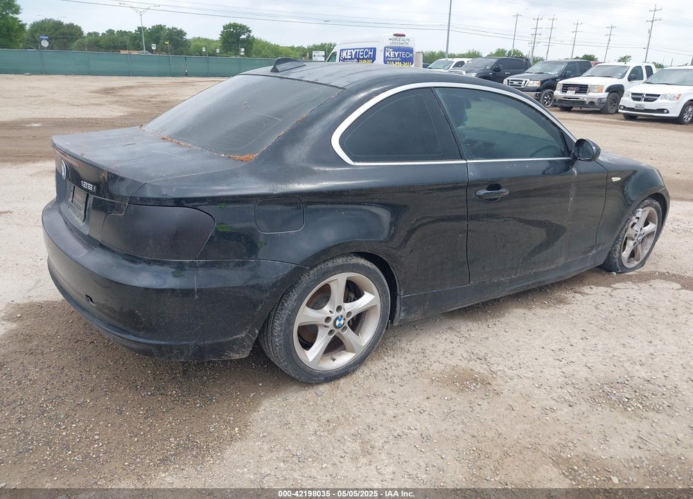 2009 BMW 128I VIN: WBAUP73579VK75780