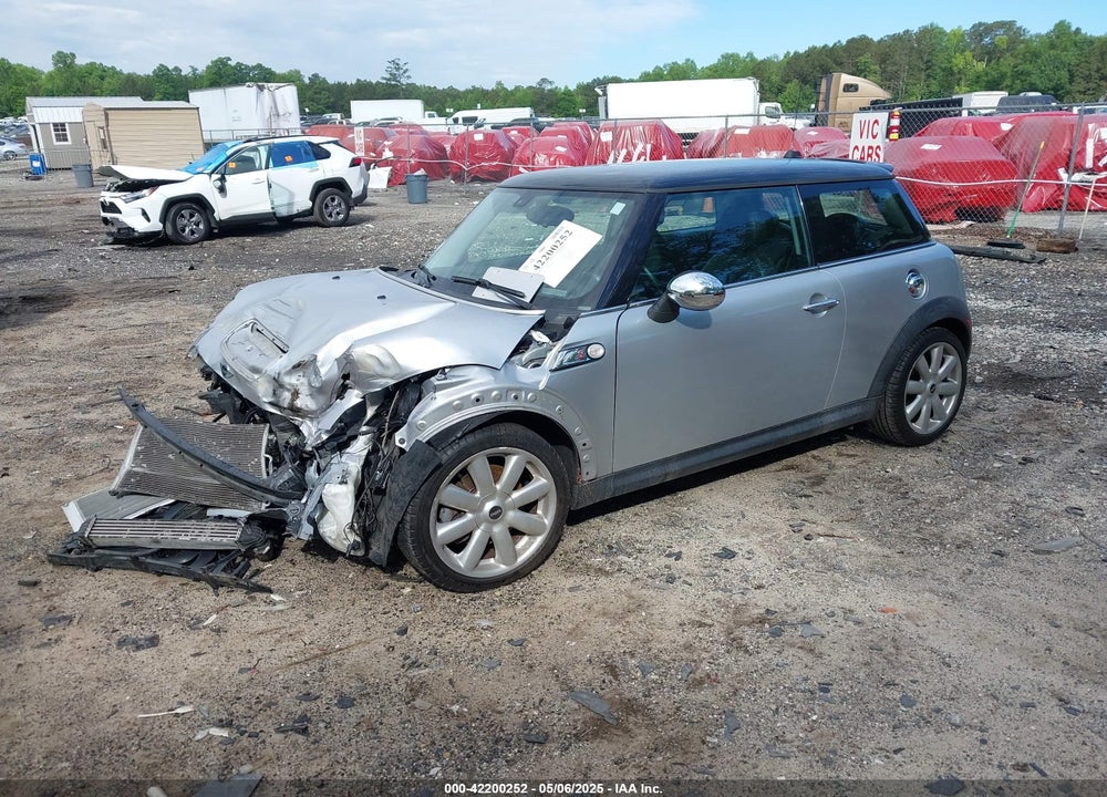 2007 MINI COOPER VIN: WMWMF73537TL88038