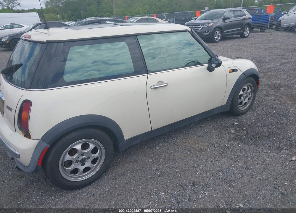 2004 MINI COOPER VIN: WMWRC33424TC53596