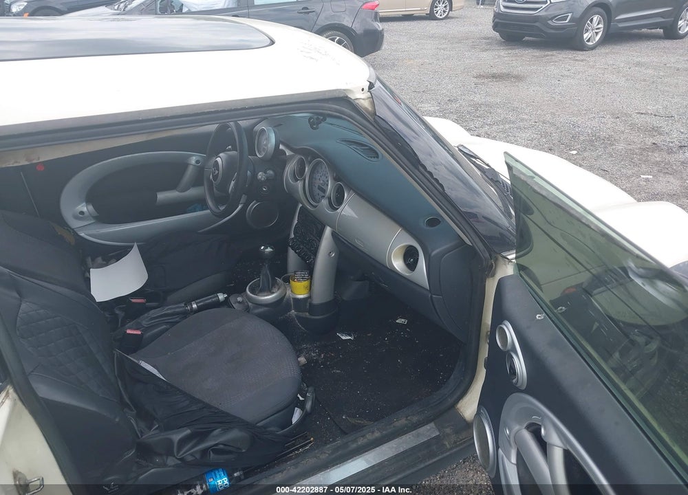 2004 MINI COOPER VIN: WMWRC33424TC53596