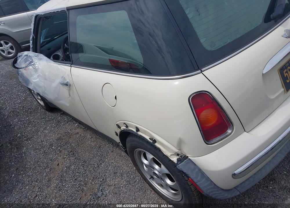 2004 MINI COOPER VIN: WMWRC33424TC53596