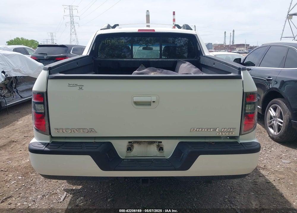 2012 HONDA RIDGELINE RTL VIN: 5FPYK1F57CB453096