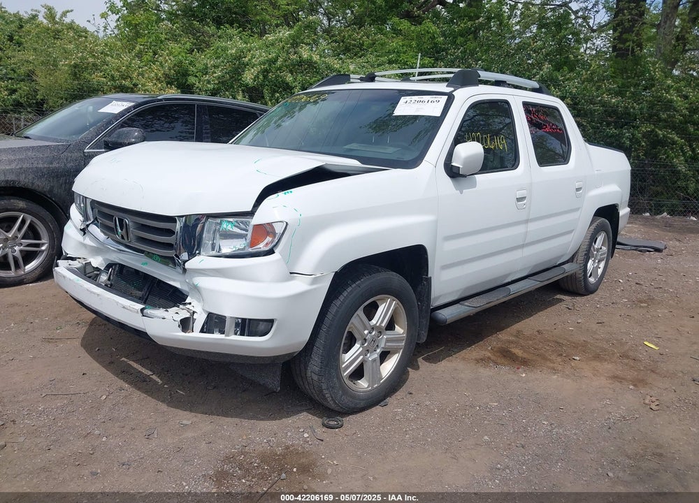 2012 HONDA RIDGELINE RTL VIN: 5FPYK1F57CB453096