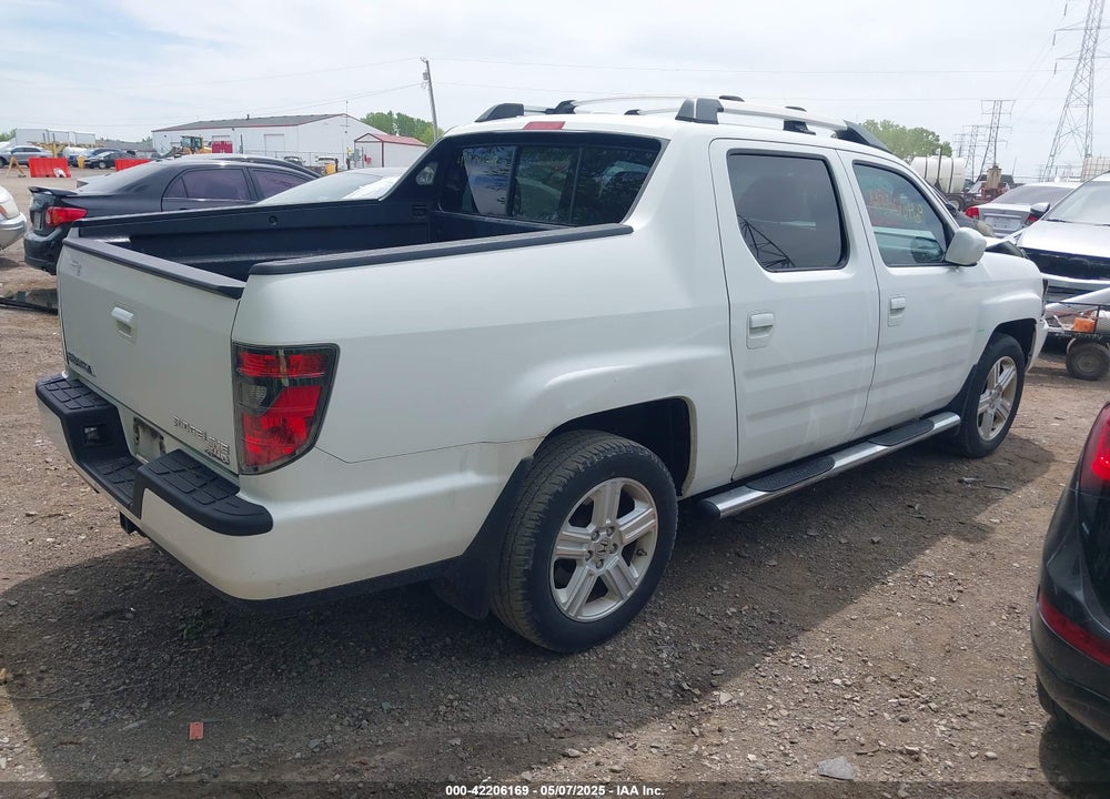 2012 HONDA RIDGELINE RTL VIN: 5FPYK1F57CB453096